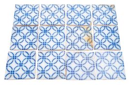A group of twelve Desrves Boulonge tiles with stencilled blue decoration, 11 x 11cm.