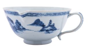 A Chinese 'Nanking Cargo' blue and white jug/sauceboat,