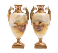 A pair of Royal Worcester two handled pedestal vases each painted by Ernest Barker with sheep in an