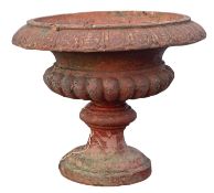 A faux terracotta stone composition garden urn, 20th century; of Campana form,