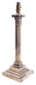 A silver plated metal columnar table lamp,
