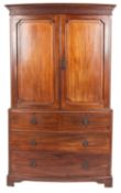 A mahogany bowfront linen press in George III style,