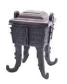 A Chinese archaistic bronze vessel [Fangding] and hardwood cover,