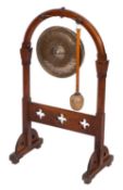 A Victorian oak and brass hung gong, in Gothic style,