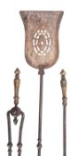 A set of three Regency or George IV steel and brass mounted fire irons,