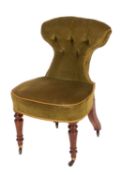 A William IV walnut and upholstered library chair by Holland & Sons; circa 1835;