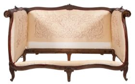 A substantial Louis XV carved oak and upholstered daybed,