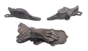 Two Austrian bronze letter clips in the form of a duck's head and a hound's head respectively;