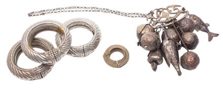 An Afro Brazilian pressed metal Penca de Balangandan,