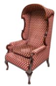 An early 20th century mahogany and moquette upholstered porter's or concierge chair,