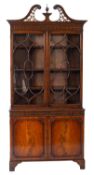A mahogany and glazed cabinet bookcase in George III style,