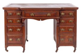 A Victorian walnut breakfront pedestal desk,