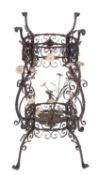 A Continental painted wrought iron stand, late 19th century; of openwork form throughout,