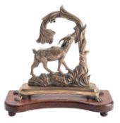 A brass and mahogany mounted door porter,