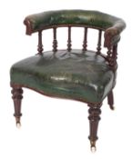 A Victorian mahogany and green leather upholstered library tub chair,