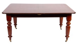 A mahogany extending dining table in mid 19th century style,