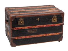 A leather bound and timber banded lacquered steamer trunk,