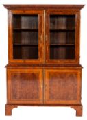 A Continental burr walnut, cross banded and glazed display cabinet, probably French,