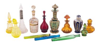 A group of ten late 19th century decorated and coloured glass scent bottles and stoppers together