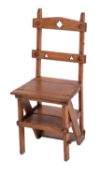 A Victorian oak library step-chair, circa 1880; as a chair,