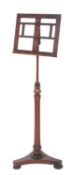 A Regency mahogany and rosewood music stand,
