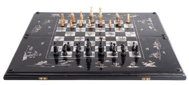 A Vietnamese black lacquer and mother of pearl inlaid chess and backgammon board
