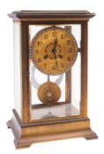 A late-Victorian French four-glass mantel clock the unsigned eight-day duration movement having an