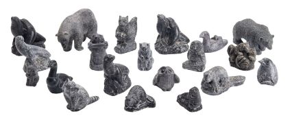 A collection of twenty Inuit simulated argillite composition models,