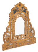 A 19th Century Italian gilt gesso easel marginal dressing table mirror, of shaped domed outline,