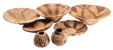 Seven various woven palm, straw-work and cord baskets, Botswana,