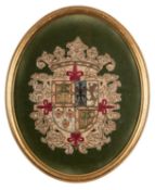 A pair of Victorian embroidered armorial panels,