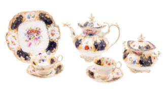 A Coalport porcelain part tea service comprising a teapot and cover sucrier,