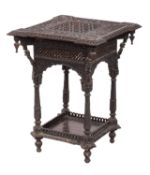 A South East Asian, probably Burmese carved coromandel occasional table,