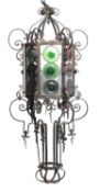 A wrought iron and coloured glass hanging lantern,