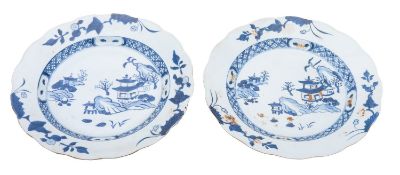 A pair of Chinese 'Nanking Cargo' dishes, Qianlong with scalloped rims,