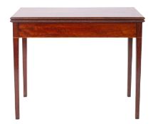 A George III mahogany tea table, circa 1770; with hinged rectangular top above a plain frieze,