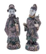 A pair of Chinese famille verte biscuit porcelain figures of Immortals,