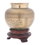 A Chinese brass vase decorated with floral panels and auspicious objects,