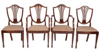 A set of eight mahogany dining chairs in Heppelwhite style,