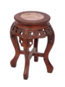 A Chinese stained hardwood and stone inset stand,