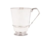 An Art-Deco period silver mug, tapering circular form,