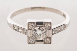 An Art Deco diamond ring, of geometric form,
