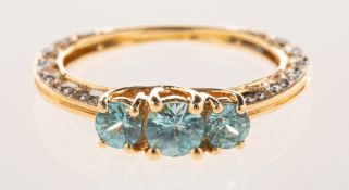 A 14ct yellow and white gold blue zircon and diamond ring,