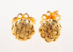 A pair of woven knot studs, screw thread posts, butterflies marked 750, Italian marks, 2.4grams.