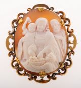 A Victorian cameo brooch, the cameo carved to depict Madonna & Child,