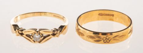 Two 9ct gold rings, including a 9ct gold ring, claw set with a small brilliant-cut diamond,