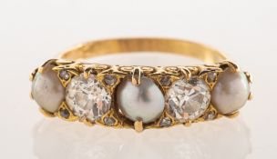 A Victorian pearl and diamond half hoop ring, claw set with three grey split pearls,