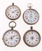 Three small silver pocket watches each with white enamel dials with black Roman numerals and floral