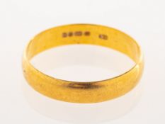 A 22ct gold wedding band, UK hallmark, size L1/2, 2.5grams.