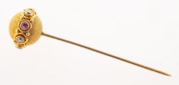An antique ruby and diamond stick pin, (possibly late Victorian/early 20th century),